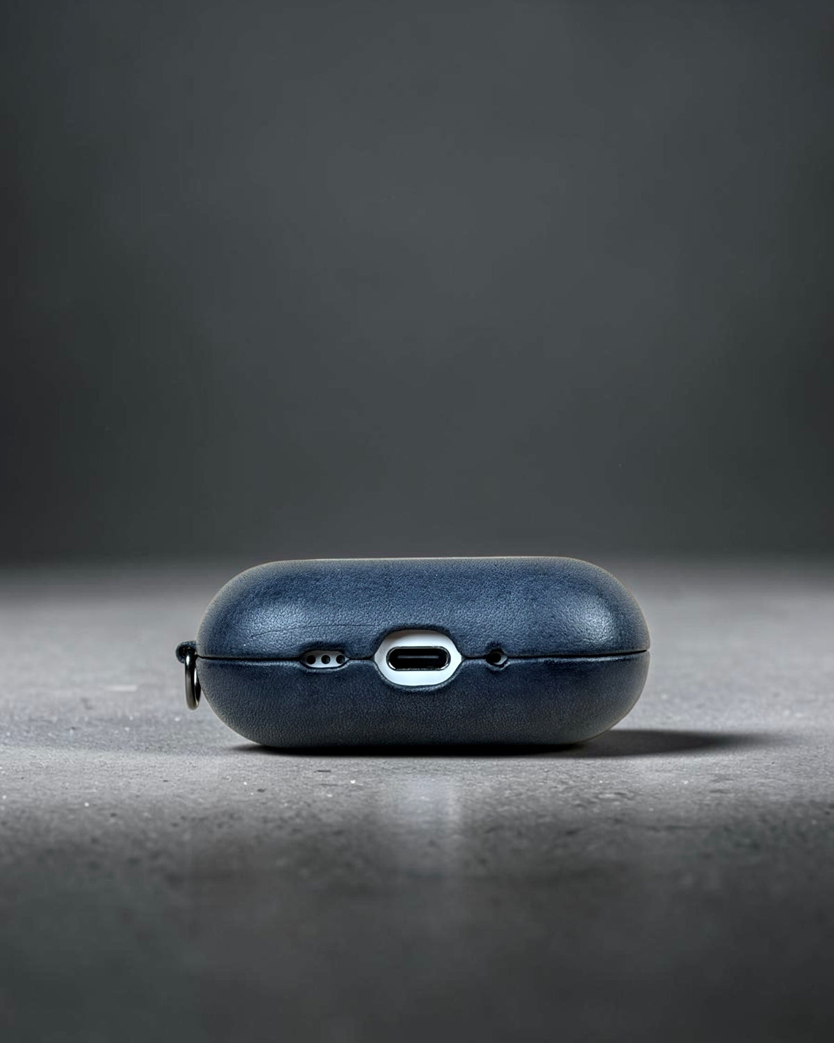 AirPods Pro 3 leather case in Vesuvio Blue, underside with USB-C cut-out #Color_Vesuvio Blue